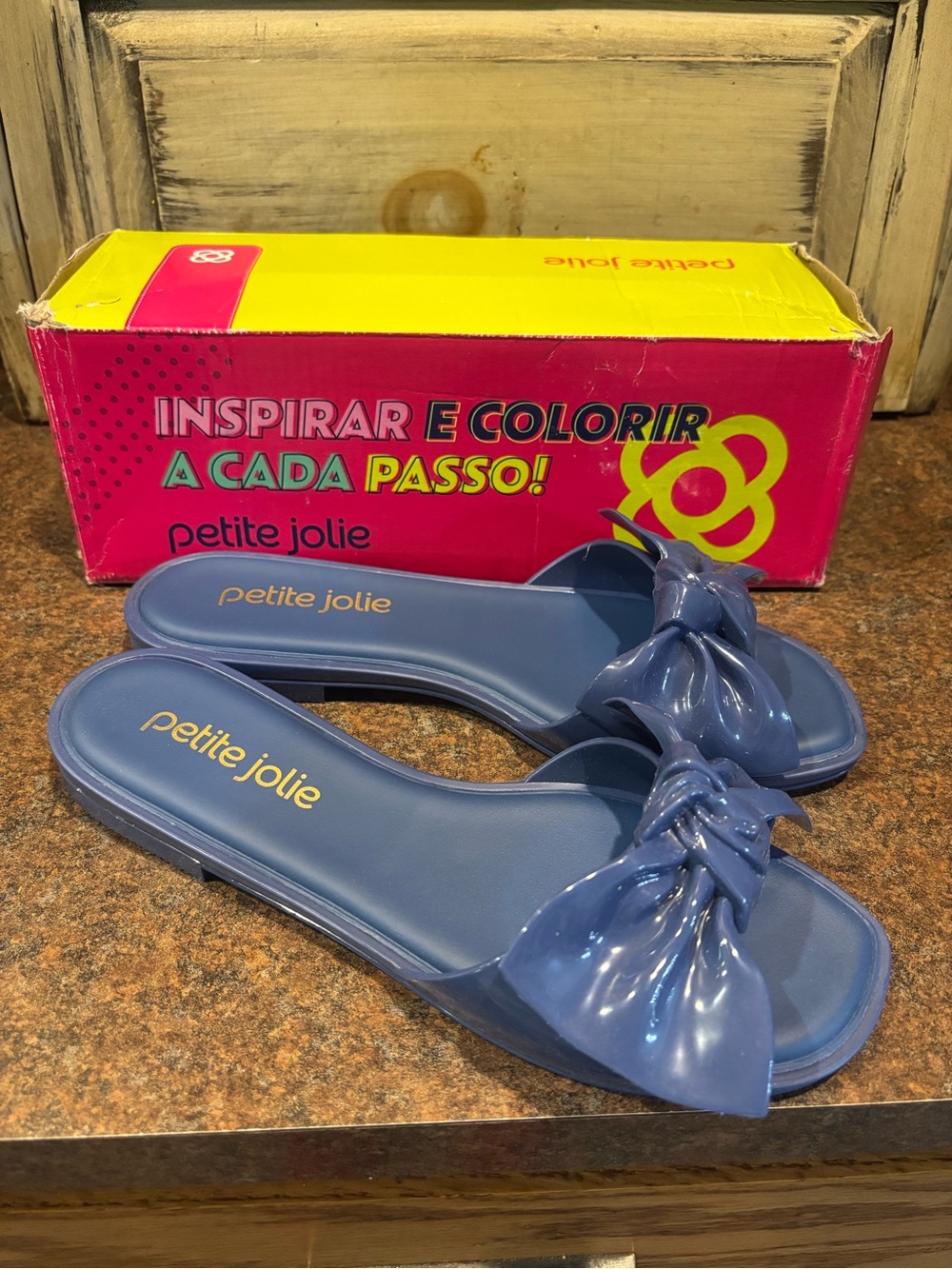 petite jolie glossy blue bow slide mules